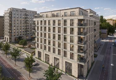 Lilla fransyskan exteriör med tegelfasad, takterrass och balkonger