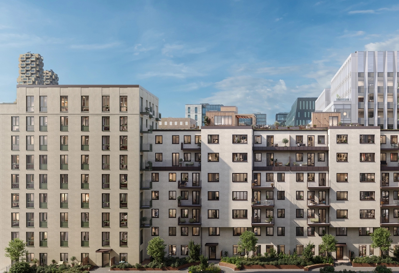 Moderna bostadshus med ljusa fasader och balkonger. Små träd framför och abstrakta byggnader i bakgrunden under blå himmel.