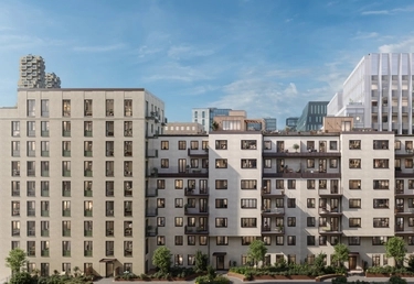 Moderna bostadshus med ljusa fasader och balkonger. Små träd framför och abstrakta byggnader i bakgrunden under blå himmel.