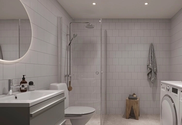 Podiums badrum med dusch, wc och kombimaskin.