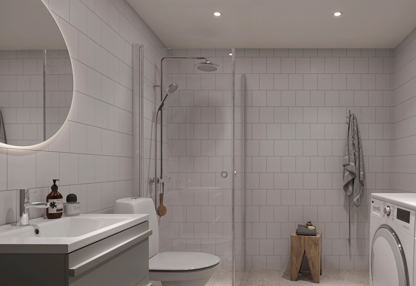 Badrum i Podium med premiuminredning och kombimaskin.