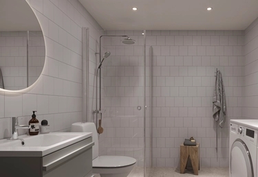 Badrum i Podium med premiuminredning och kombimaskin.