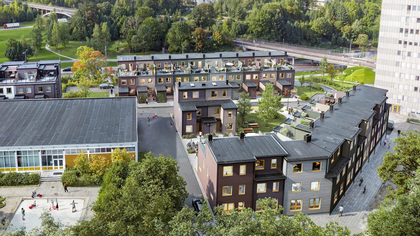 Radhusområde med hus i tre plan vid Råcksta tunnelbanestation.