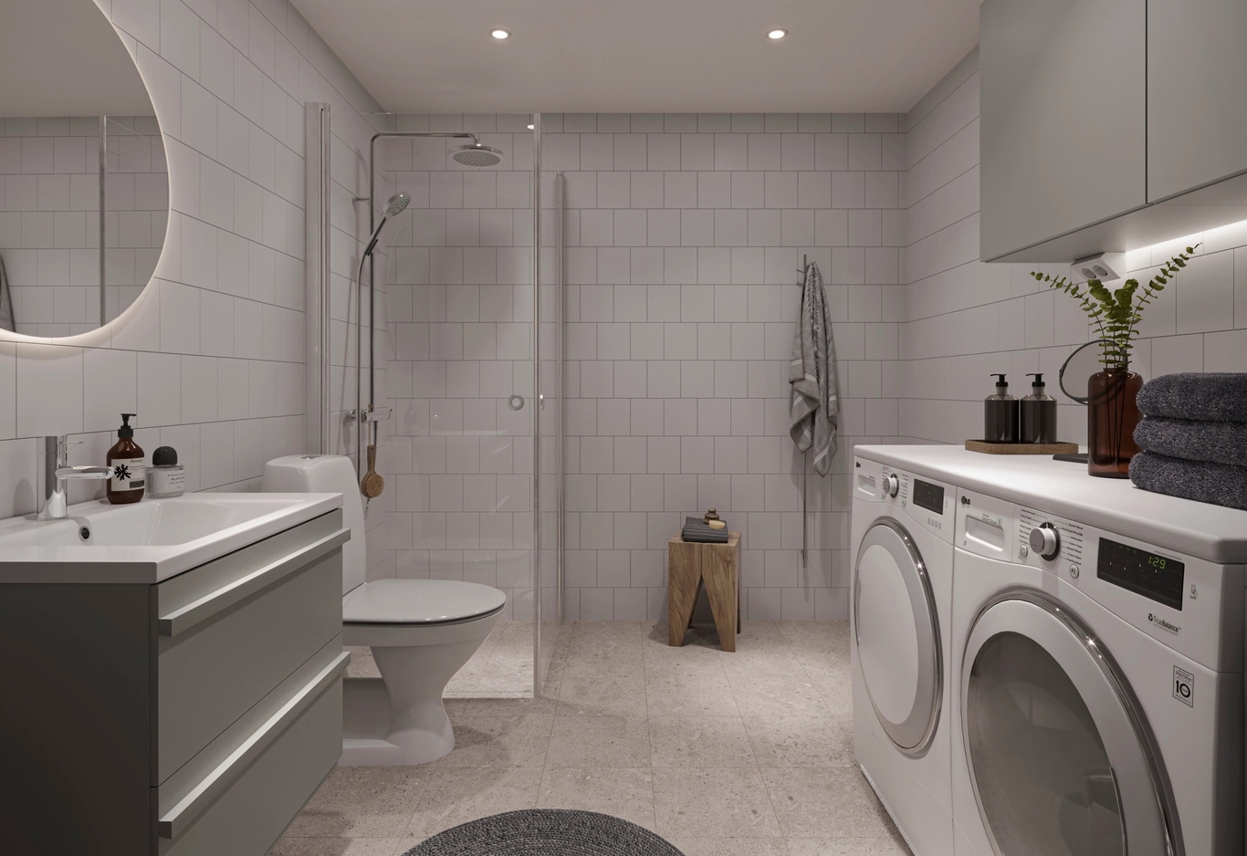 Badrum i House of Nelly med kommod, takdusch, tvättmaskin och torktumlare.