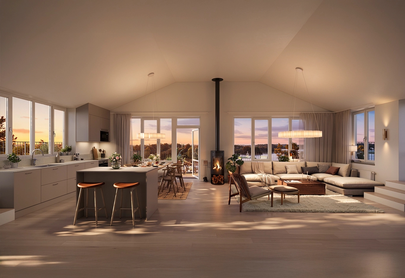Rymligt modernt vardagsrum och kök i öppen planlösning med stora fönster, neutral inredning och kvällsljus.